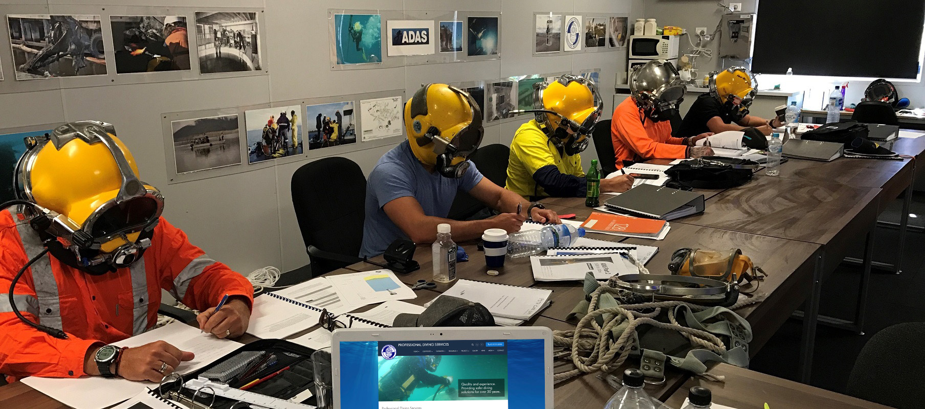 ADAS Occupational Diver Training students with helmets