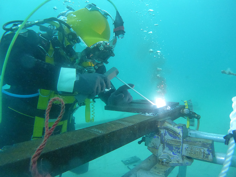 Commercial diving student welding