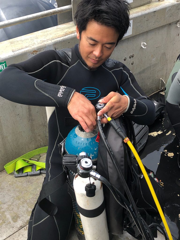 Adas Part 1 commercial diving student preparing for dive