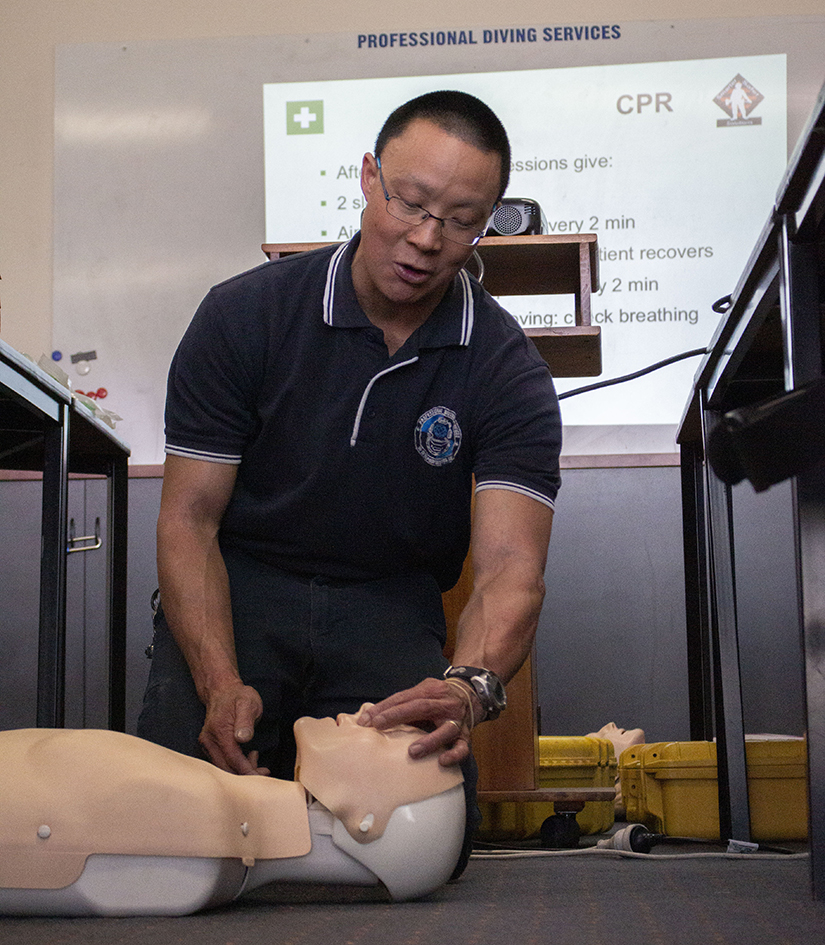 Johnny Lau CPR demonstration on dummy