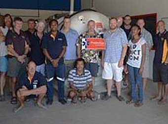 PDTA chamber operator students in front of Chamber