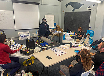 Aquarium diving students in classroom